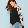 Blusa Talla Plus florar de cuello redondo negra en Paraíso de la Moda